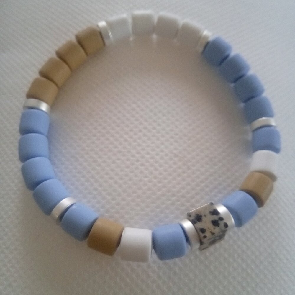 Bracelet...stretch bracelet, center cube shaped bead...7 1/2 inches